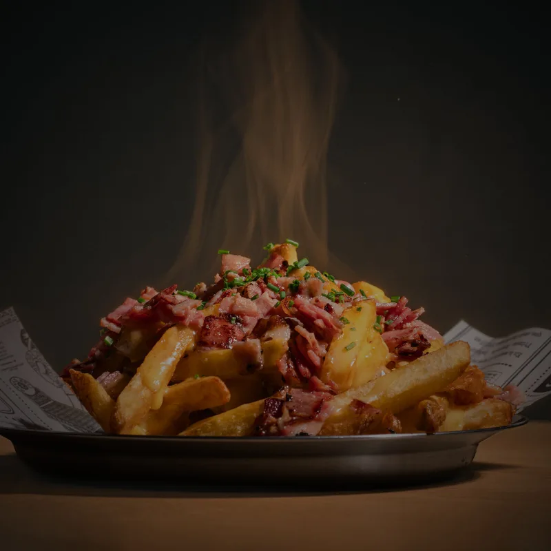 Patatas Deluxe, Con salsa cheddar y bacon crujiente